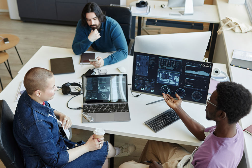 Group of developers collaborating on solutions for complex problems